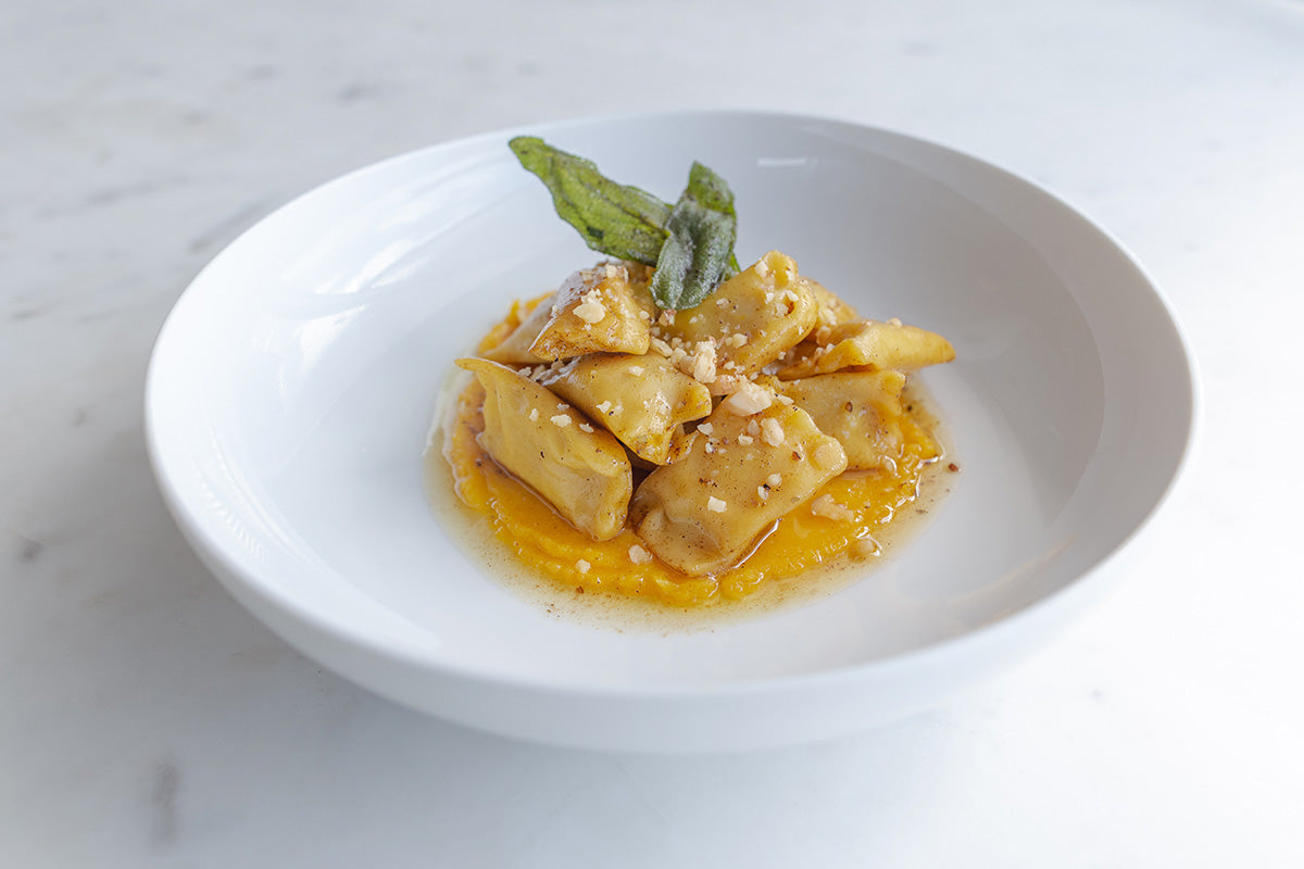 A plated bowl of fresh handmade pasta from Pasta Packs